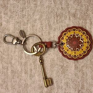 Fossil keychain flower with key